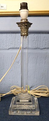 Lot 300 - A glass table lamp on stepped rectangular...