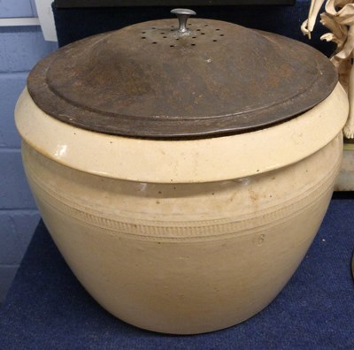 Lot 309 - A large ceramic bread bin with metal cover...