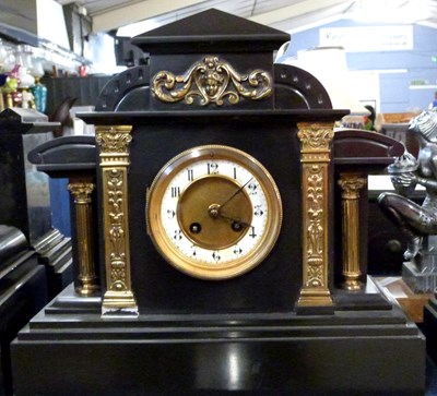 Lot 316 - A Victorian black slate mantel clock in...