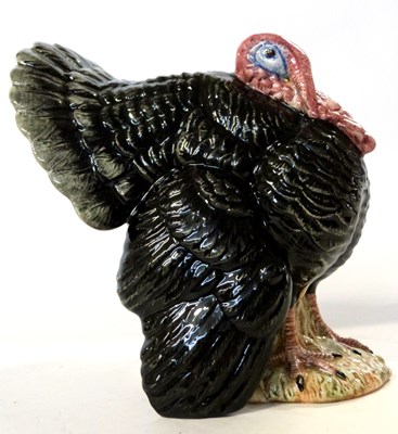 Lot 381 - A Royal Doulton model of a black turkey,...