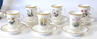 Lot 384 - A set of Royal Worcester chocolate cups and...