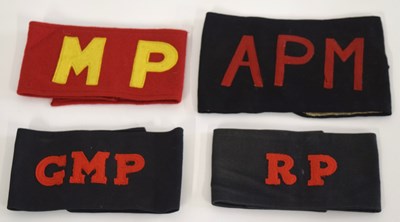 Lot 58 - Quantity of Four Military police armbands to...