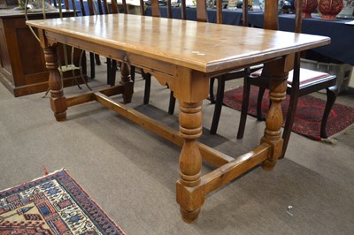 Lot 450 - A 20th Century pine refectory dining table...
