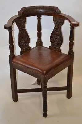 Lot 532 - A Victorian oak corner chair with carved...