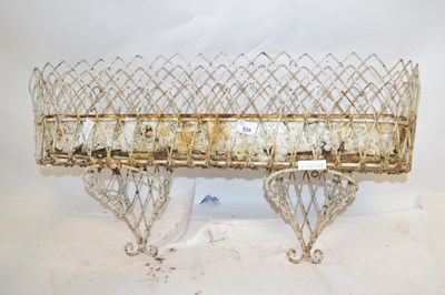 Lot 539 - A wall mounted wire work Victorian plant stand,...