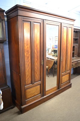 Lot 472 - A Victorian mahogany and walnut triple door...