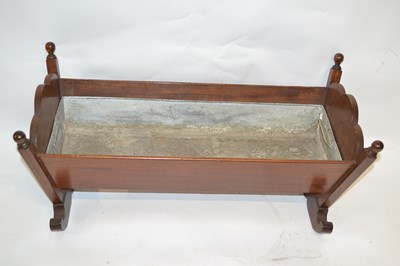 Lot 488 - A mahogany and metal lined planter formed as a...