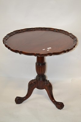Lot 478 - A George III style mahogany tilt top supper...