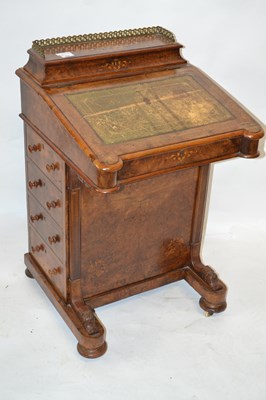 Lot 515 - A Victorian walnut veneered Davenport desk of...