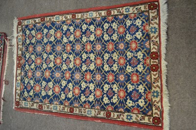 Lot 562 - A small 20th Century Middle Eastern wool floor...