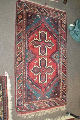 Lot 563 - Small Turkish wool rug decorated with a large...