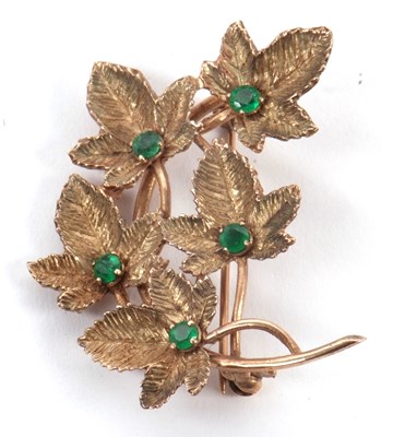 Lot 134 - An emerald set leaf brooch by Zeeta, the five...