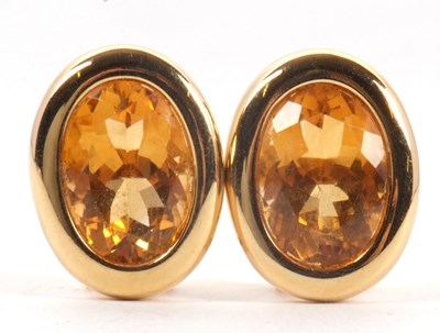 Lot 116 - A pair of citrine earrings, the oval citrines...