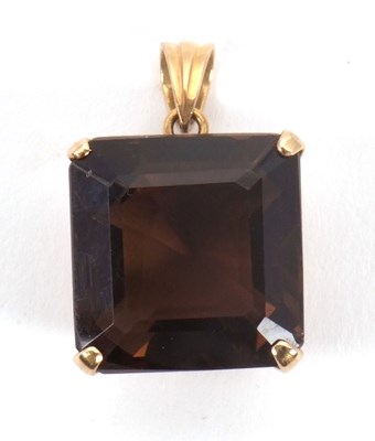 Lot 115 - A smokey quartz pendant, the square emerald...