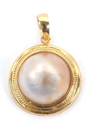 Lot 105 - A mabe pearl pendant, the round cultured mabe...