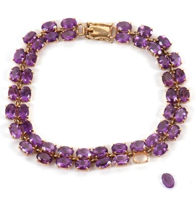 Lot 124 - An amethyst bracelet, comprised of two rows of...