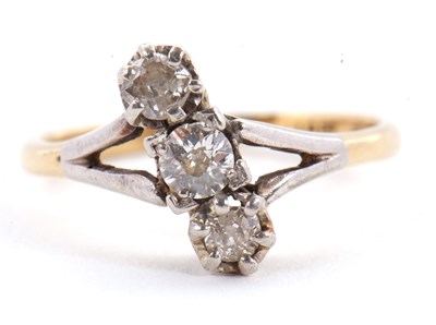 Lot 44 - A three stone diamond ring, the three old mine...