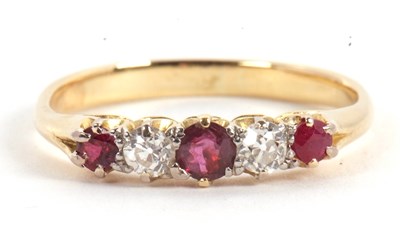 Lot 50 - A ruby and diamond ring, the alternating round...