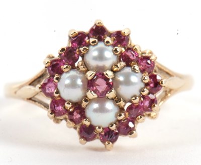 Lot 47 - A 9ct ruby and split pearl ring, the central...