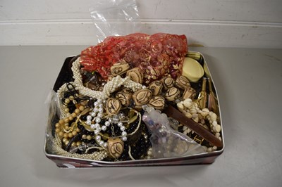 Lot 136 - BISCUIT TIN OF COSTUME JEWELLERY