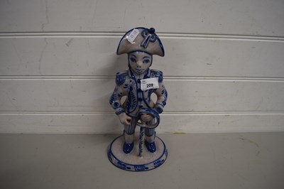 Lot 209 - 20TH CENTURY DELFT MODEL OF A MILITARY FIGURE