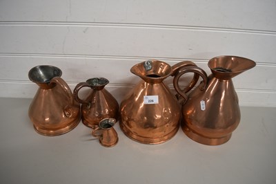 Lot 226 - FIVE VARIOUS COPPER HAYSTACK MEASURES