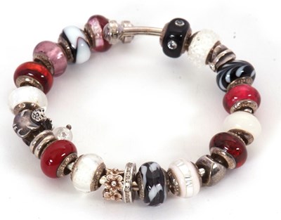 Lot 204 - A Lovelinks bracelet, the branded bangle with...
