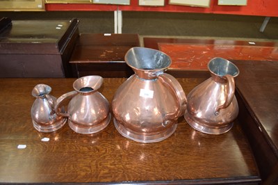 Lot 396 - FOUR COPPER HAYSTACK MEASURES