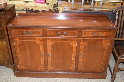 Lot 410 - REPRODUCTION MAHOGANY VENEERED THREE DOOR...