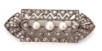 Lot 80 - An Art Deco diamond brooch, set to centre with...