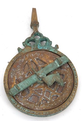 Lot 149 - An antique Indo Persian bronze Quibla...