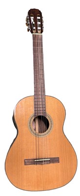 Lot 143 - A Cort 6-string acoustic guitar, model number:...