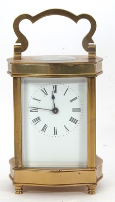Lot 223 - A four glass brass carriage clock featuring...
