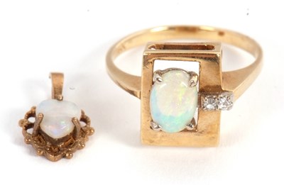 Lot 112 - An opal and diamond ring and an opal pendant,...