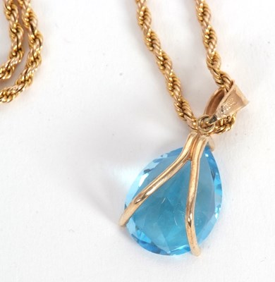 Lot 85 - A topaz pendant necklace, the pear shape topaz,...