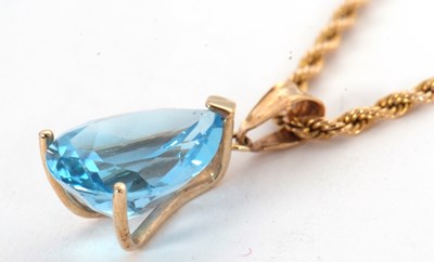 Lot 85 - A topaz pendant necklace, the pear shape topaz,...