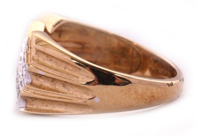 Lot 2 - A 9ct diamond ring, set with three diagonal...