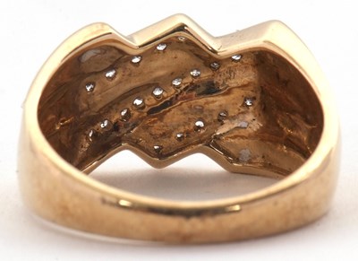 Lot 2 - A 9ct diamond ring, set with three diagonal...