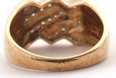 Lot 2 - A 9ct diamond ring, set with three diagonal...