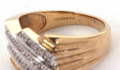 Lot 2 - A 9ct diamond ring, set with three diagonal...
