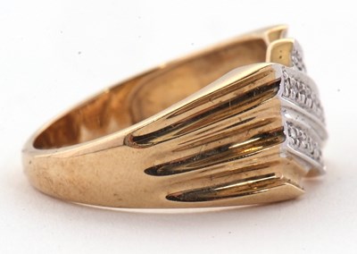 Lot 2 - A 9ct diamond ring, set with three diagonal...
