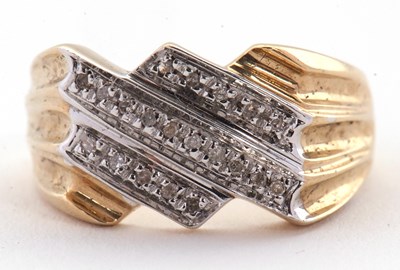 Lot 2 - A 9ct diamond ring, set with three diagonal...