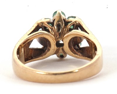 Lot 8 - A 9ct emerald and diamond cluster ring, the...