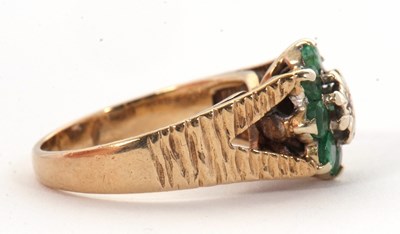 Lot 8 - A 9ct emerald and diamond cluster ring, the...