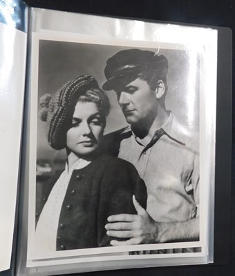 Lot 475 - Six folders circa 120 film stills/lobby cards,...