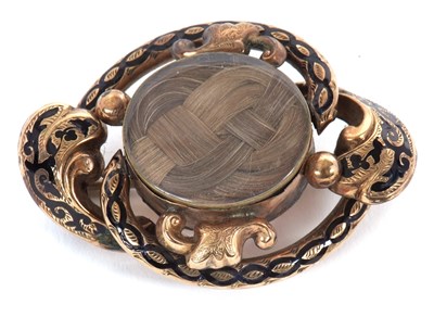 Lot 106 - A Victorian mourning brooch, the central...