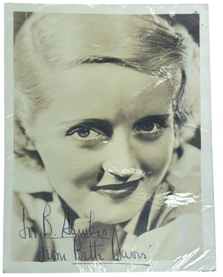 Lot 48 - A black and white headshot bearing the...