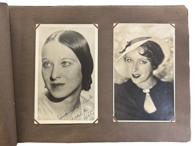 Lot 46 - An album containing a quantity of signed...