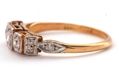Lot 17 - A three stone diamond ring, the three slightly...