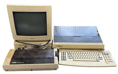 Lot 440 - An AMSTRAD PCW9512 computer, together with...